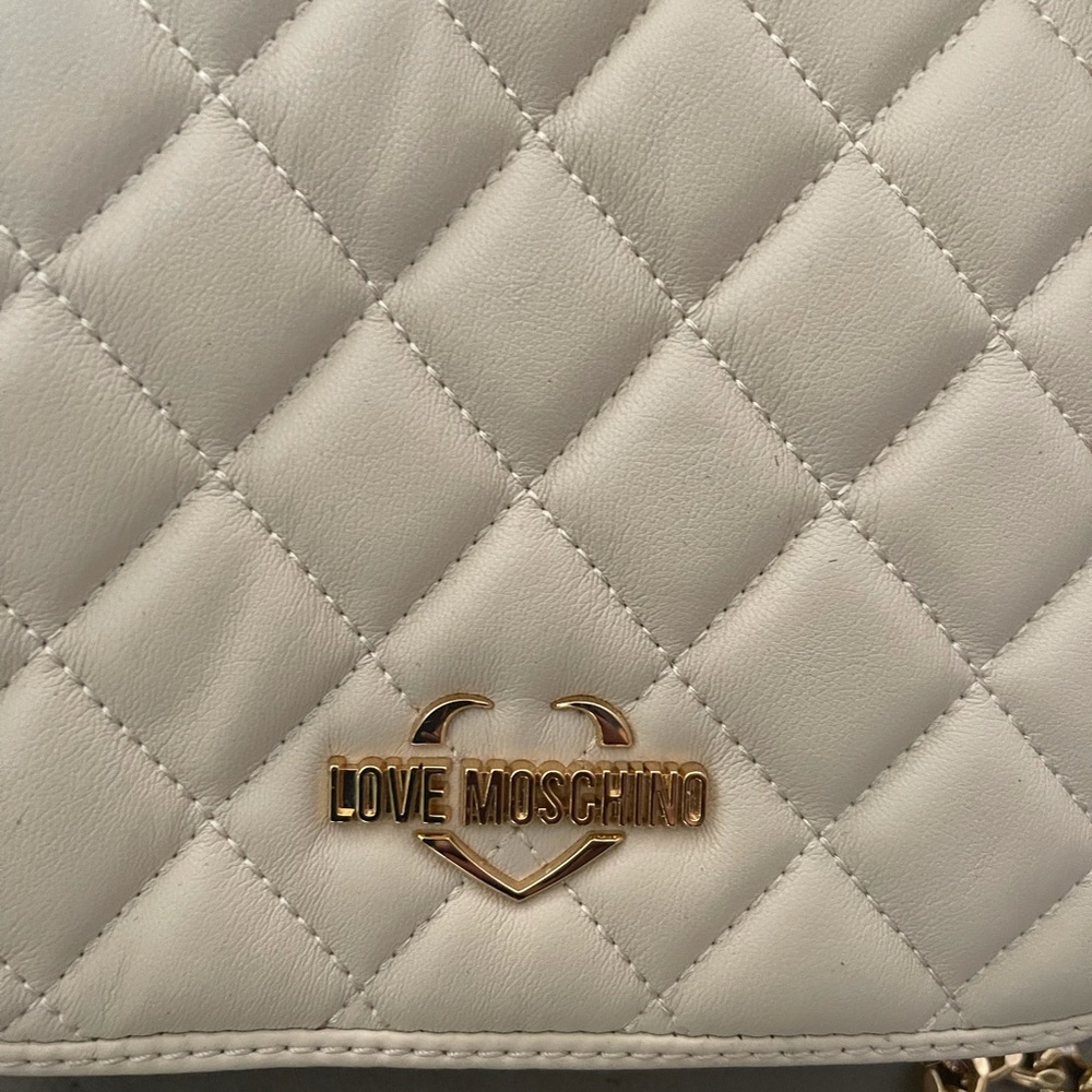 New never used love Moschino bag